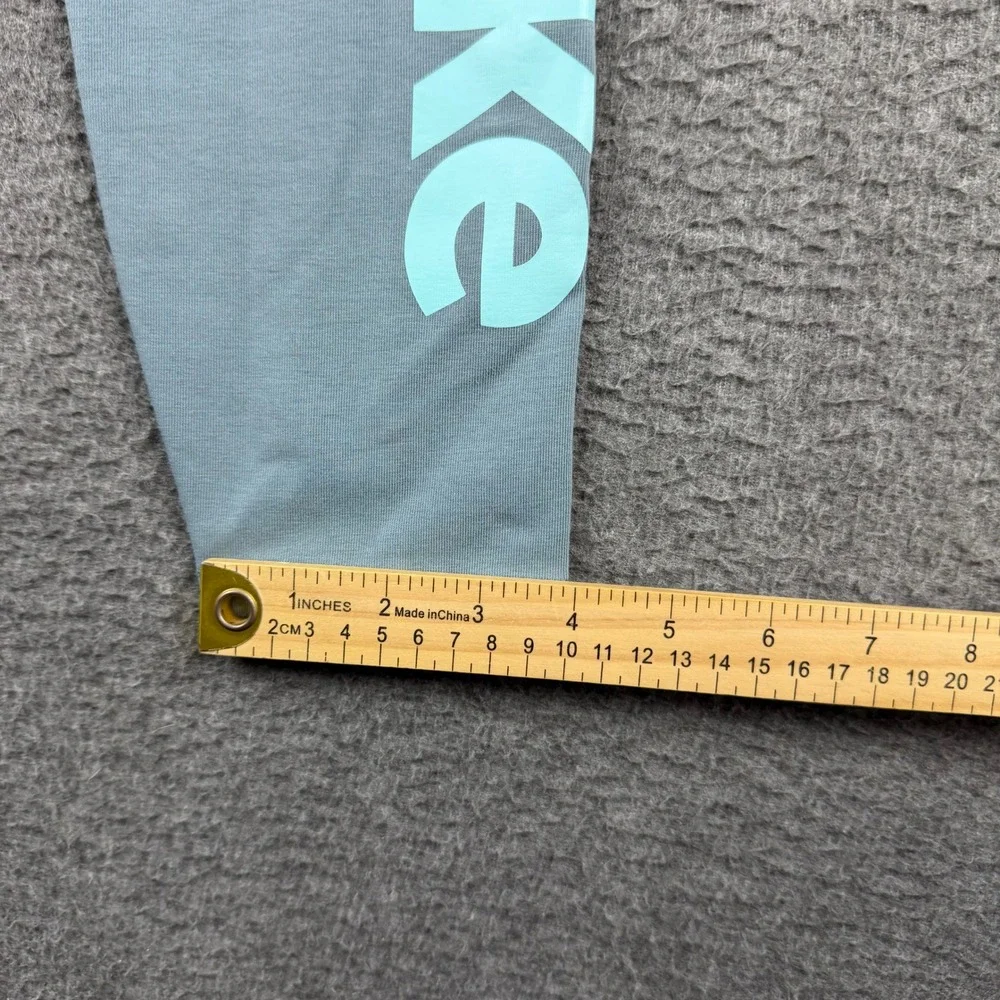 Nike Women's M Medium‎ Blue Gray Teal Graphic Logo Leggings Sportswear 429425